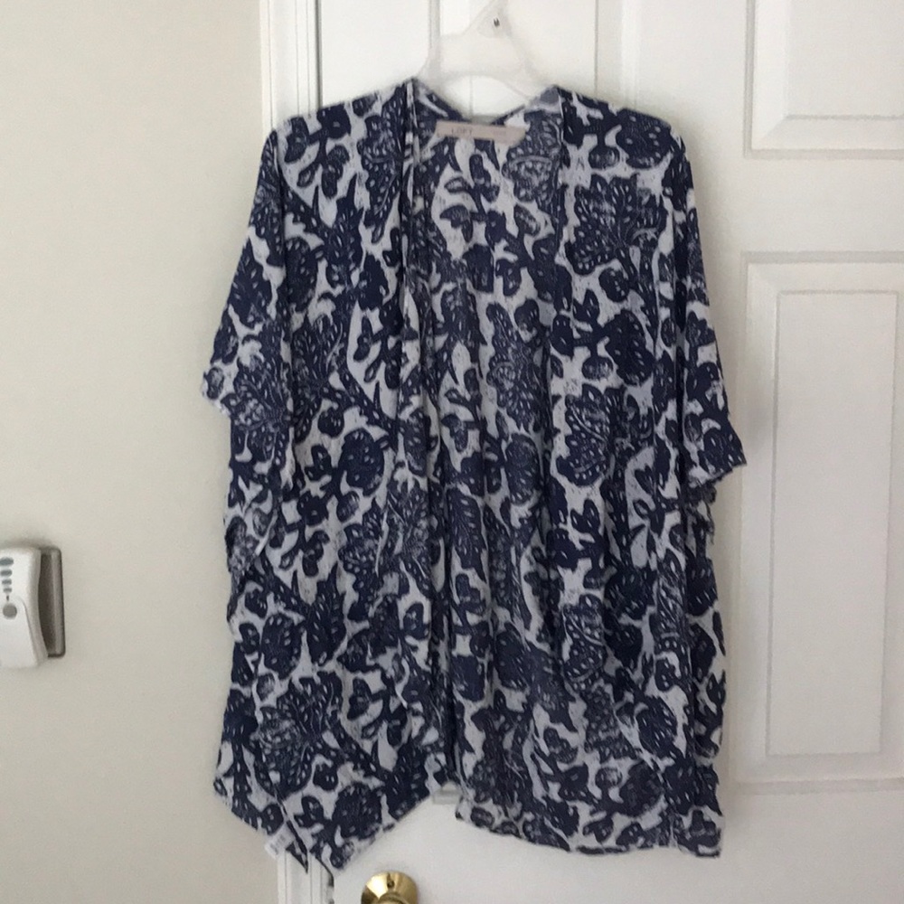 Blue and white summer poncho